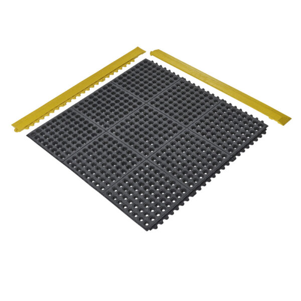 The Nitrile Top Interlocking Mat is a black, square anti-fatigue floor mat with circular holes and interlocking edges, shown with two yellow bevelled edge pieces aligned along the top and left sides.