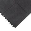 A close-up view of the Solid Top Interlocking Mat, highlighting its black textured surface and interlocking edges.