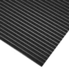 The Fine Ribbed Matting Roll features a black surface with evenly spaced diagonal raised grooves forming a striped pattern.